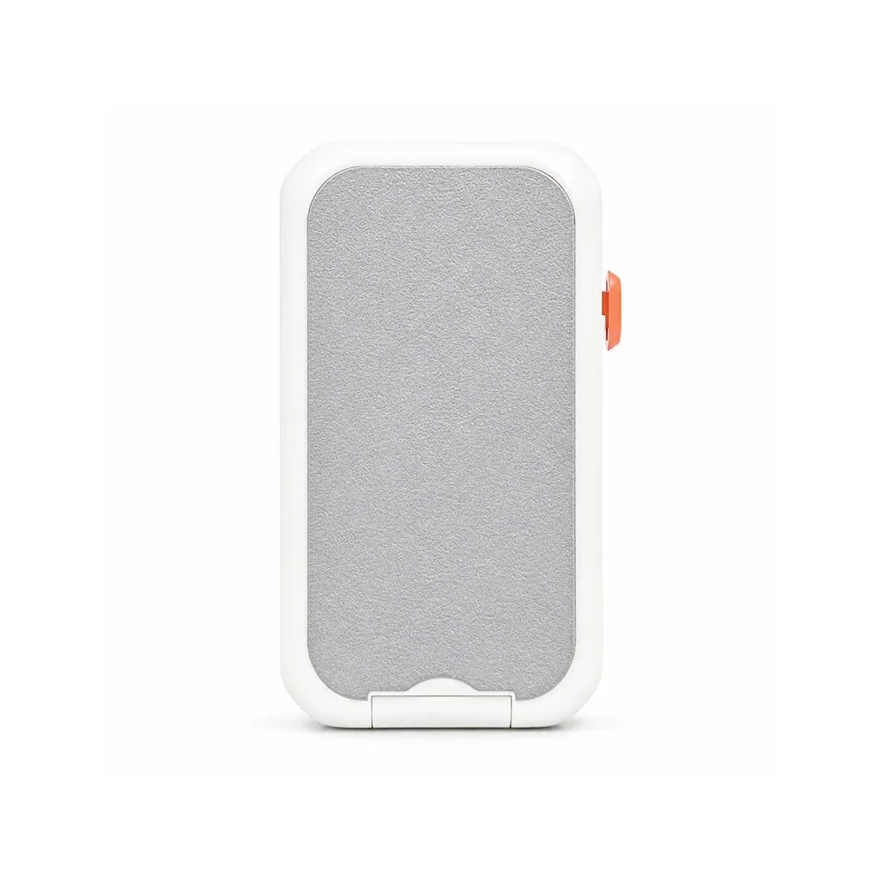 Smartphone resting on the fold-out phone holder of a white gadget cleaning kit