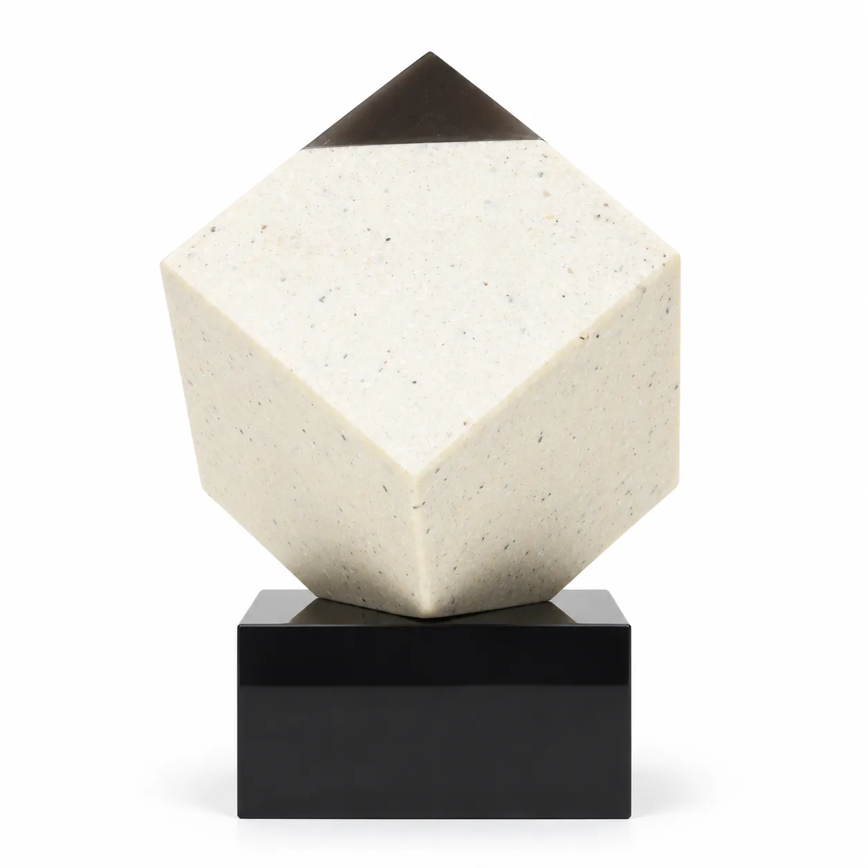 Diamond corner crystal cube on a black base on a desk