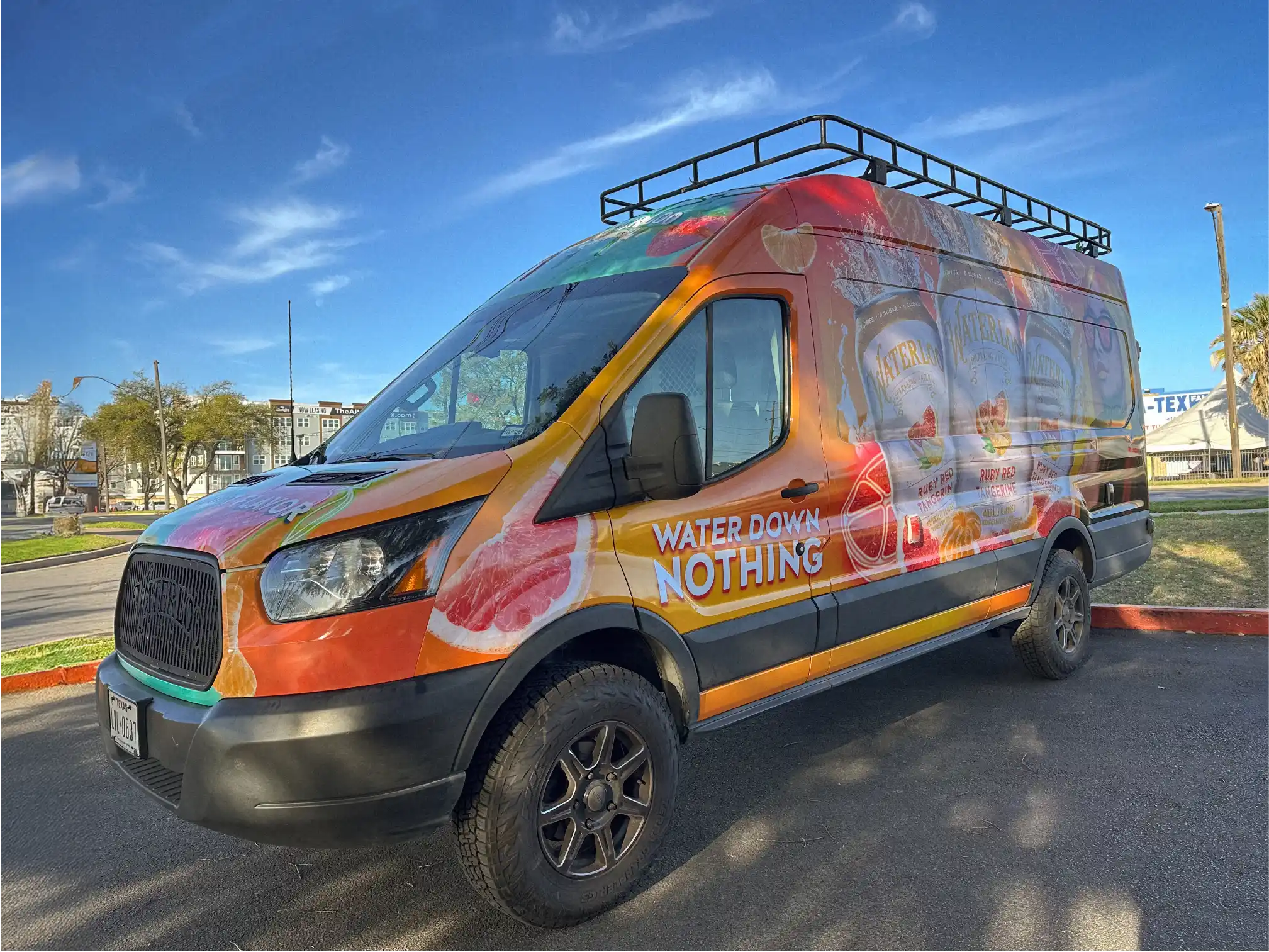 Professional vehicle wrap with colorful graphics - Canvas Advertising Austin TX