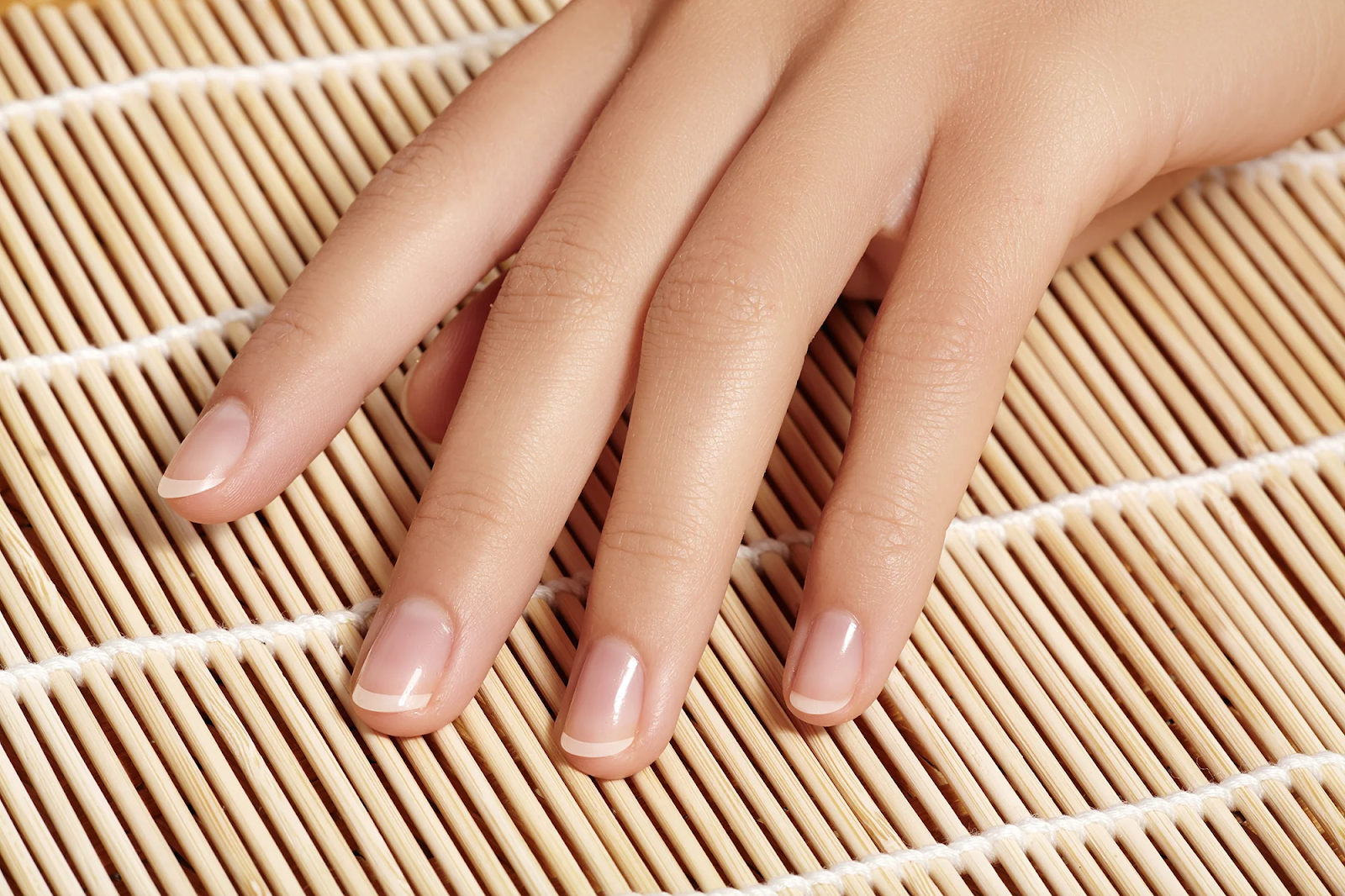 Healthy, smooth natural nails supported by consistent and proper tool sanitation practices.