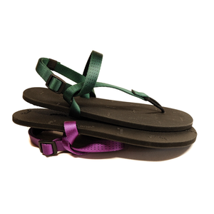 A pair of deliberate life design sandals