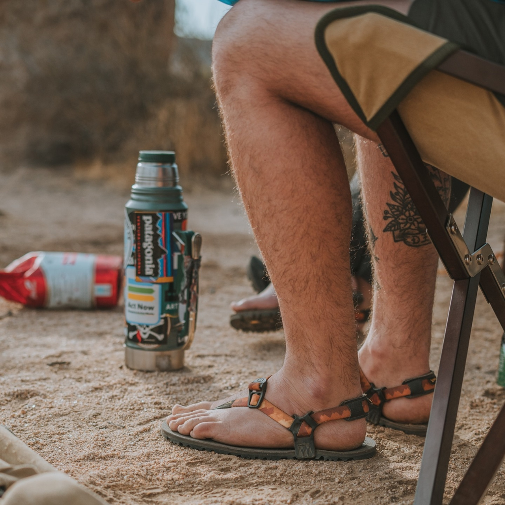 A man's legs wearing Luna barefoot sandals