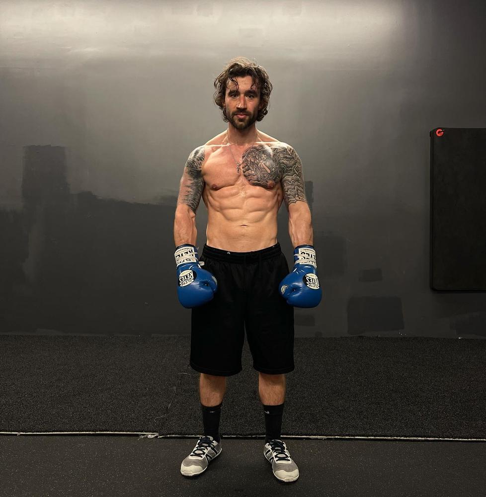 A man in boxing loves wearing Xero Shoes HFS | Barefoot Shoe