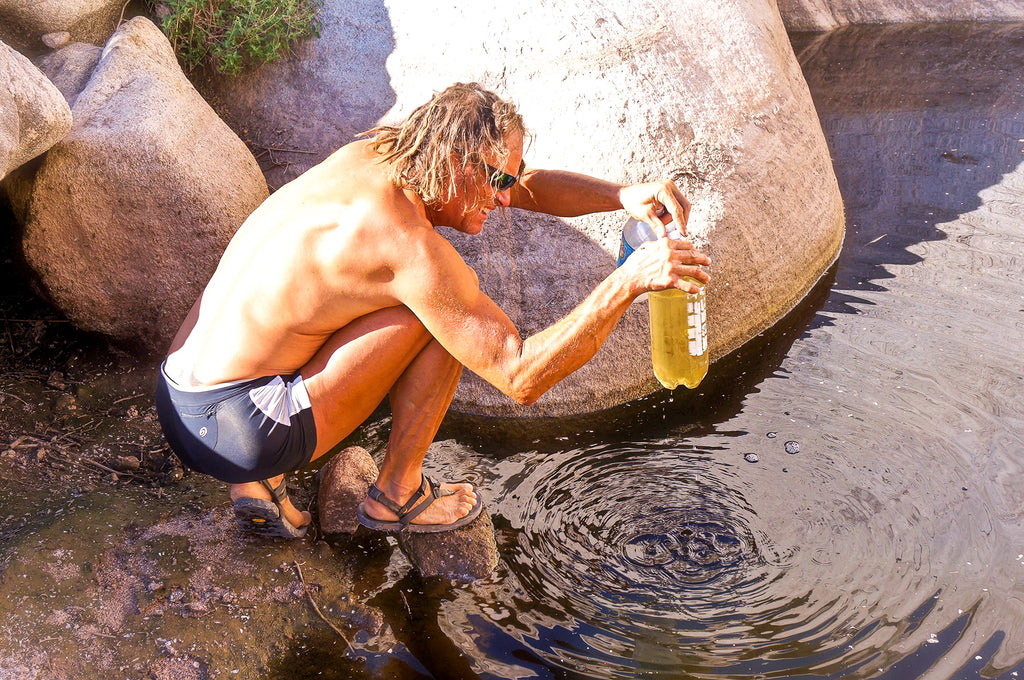 A man wearing Middle Bear Winged barefoot sandals