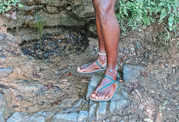 A man standing with Earthrunners Circadian barefoot sandals