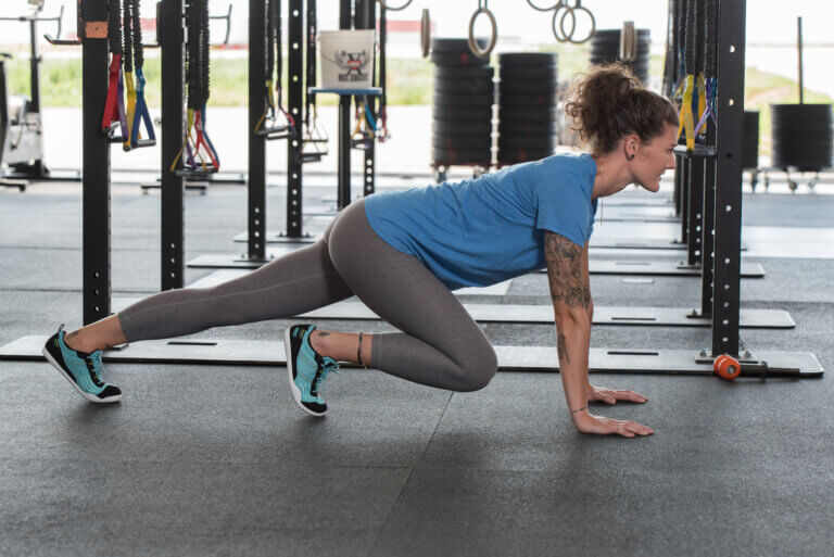 Woman doing exercise with xero barefoot shoe on