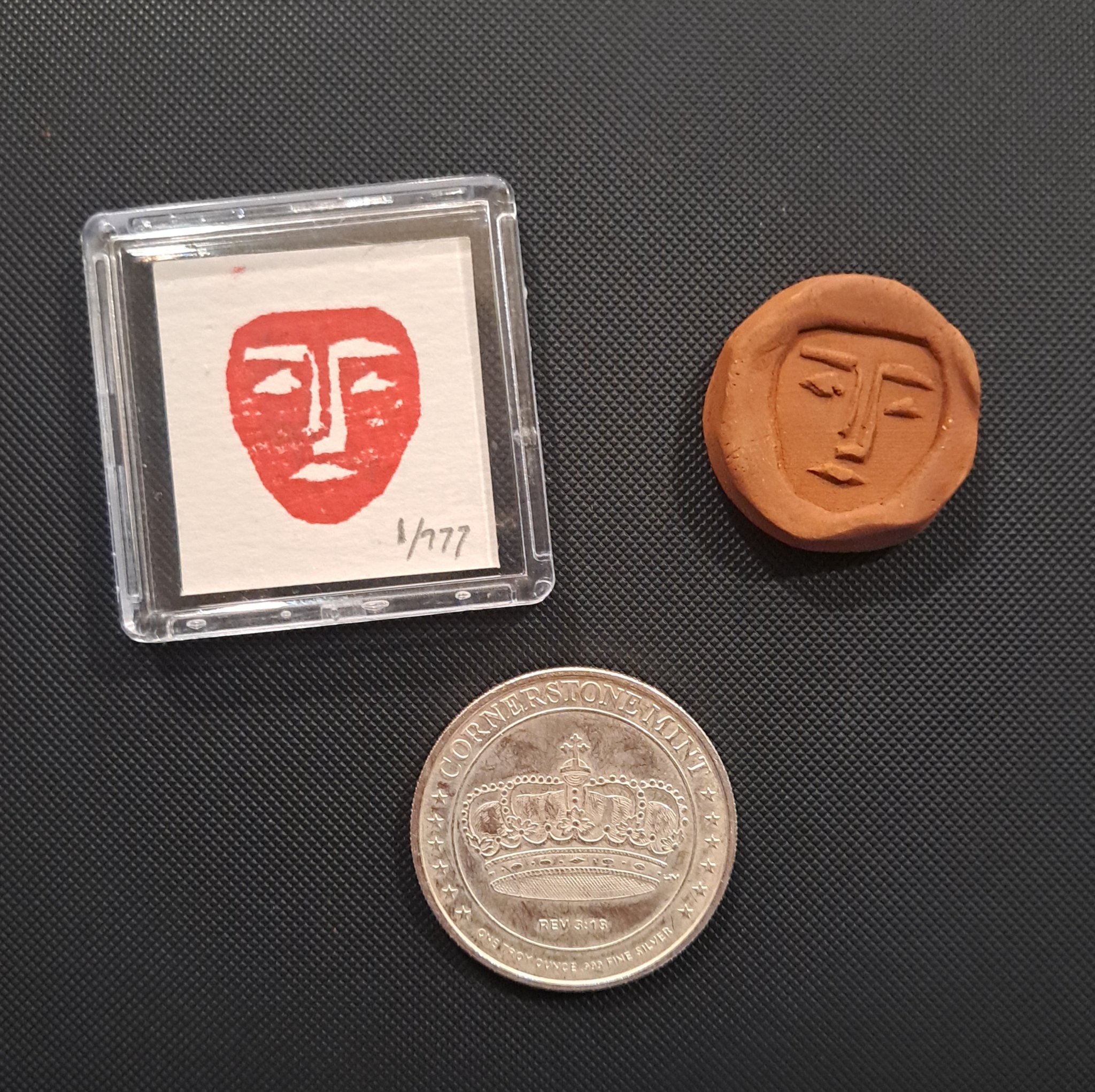 Sovereign Impression and Medallion shown with silver coin for scale reference (1 SV)