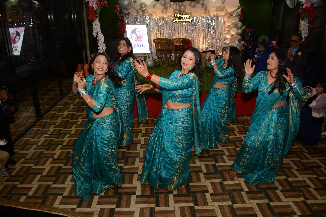 Sisters of the bride dancing with joy.