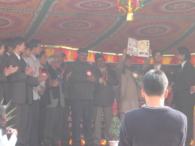 Unveiling of the "Smriti" magazine by the event team.
