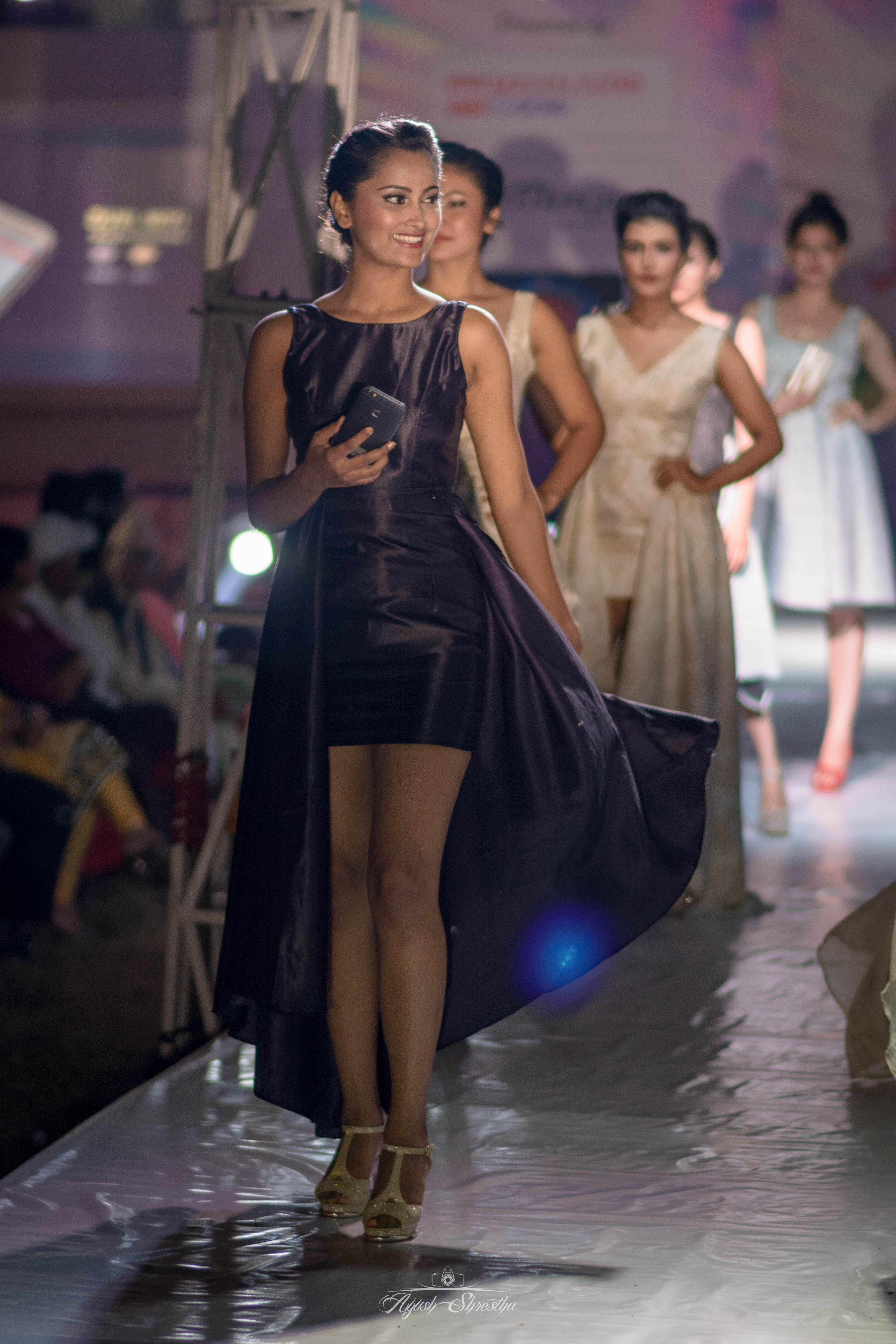 Models in sequence on the ramp.