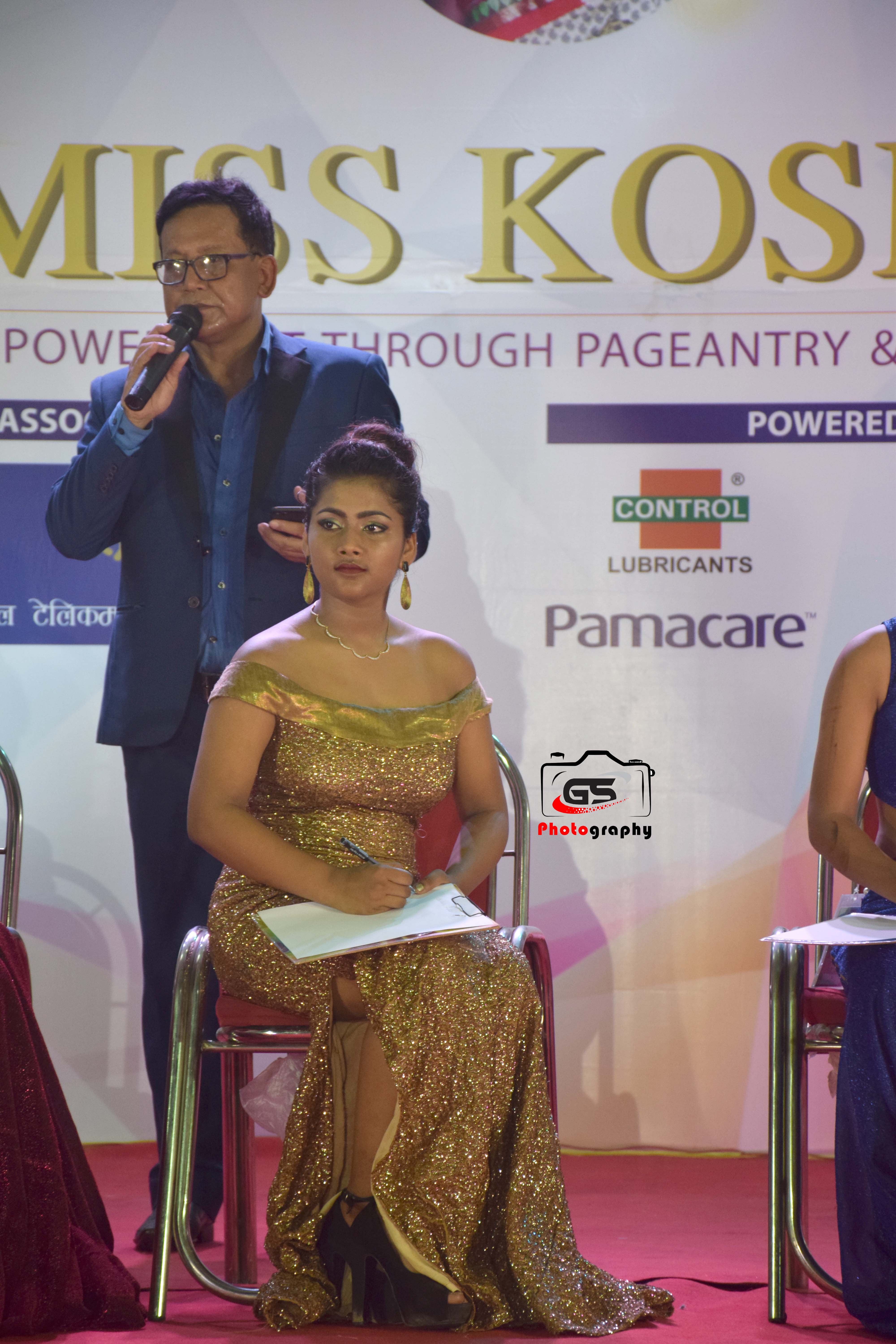 MC Dinesh DC hosting the event on stage.