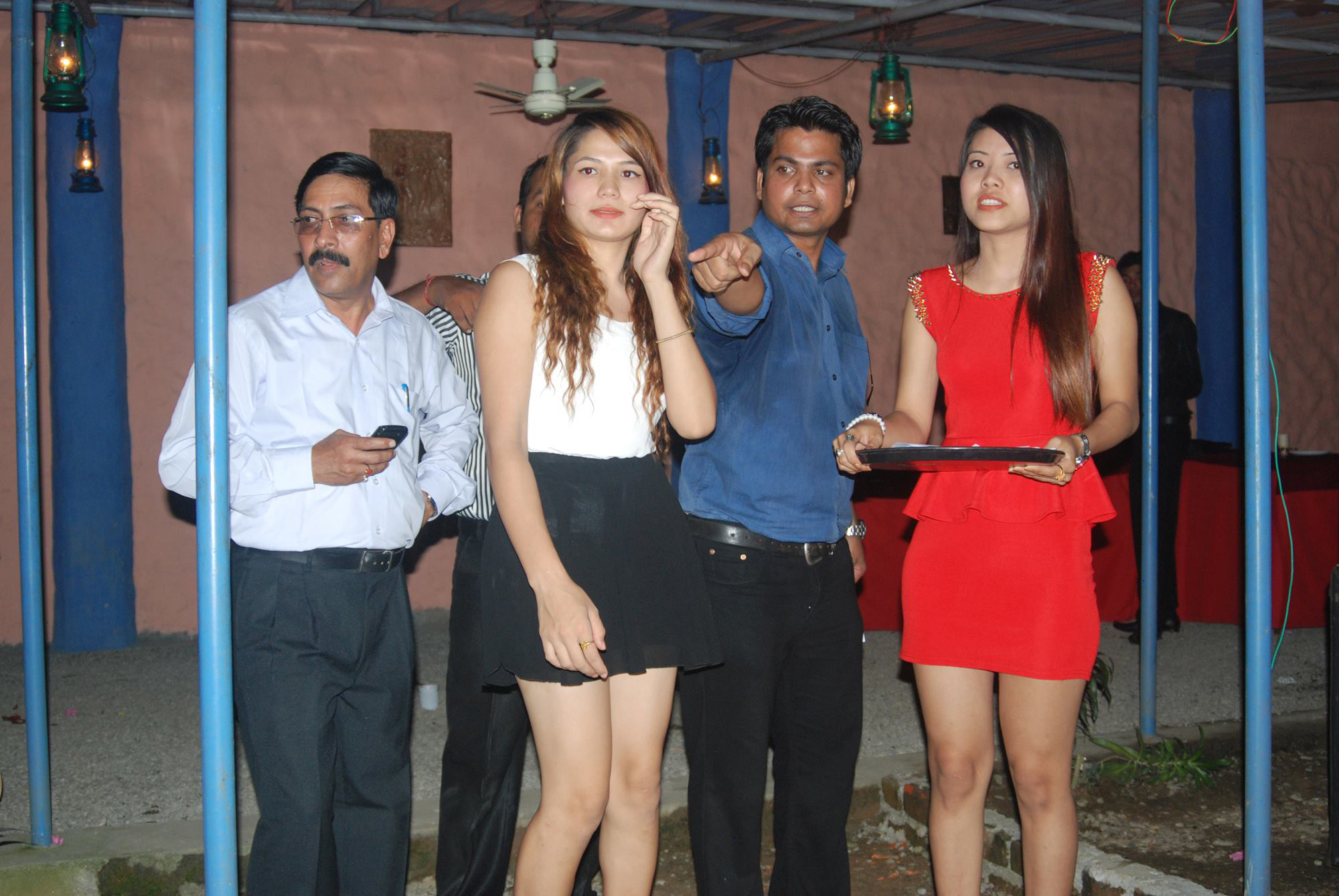 Event Manager Rikesh Karna with the event ushers.