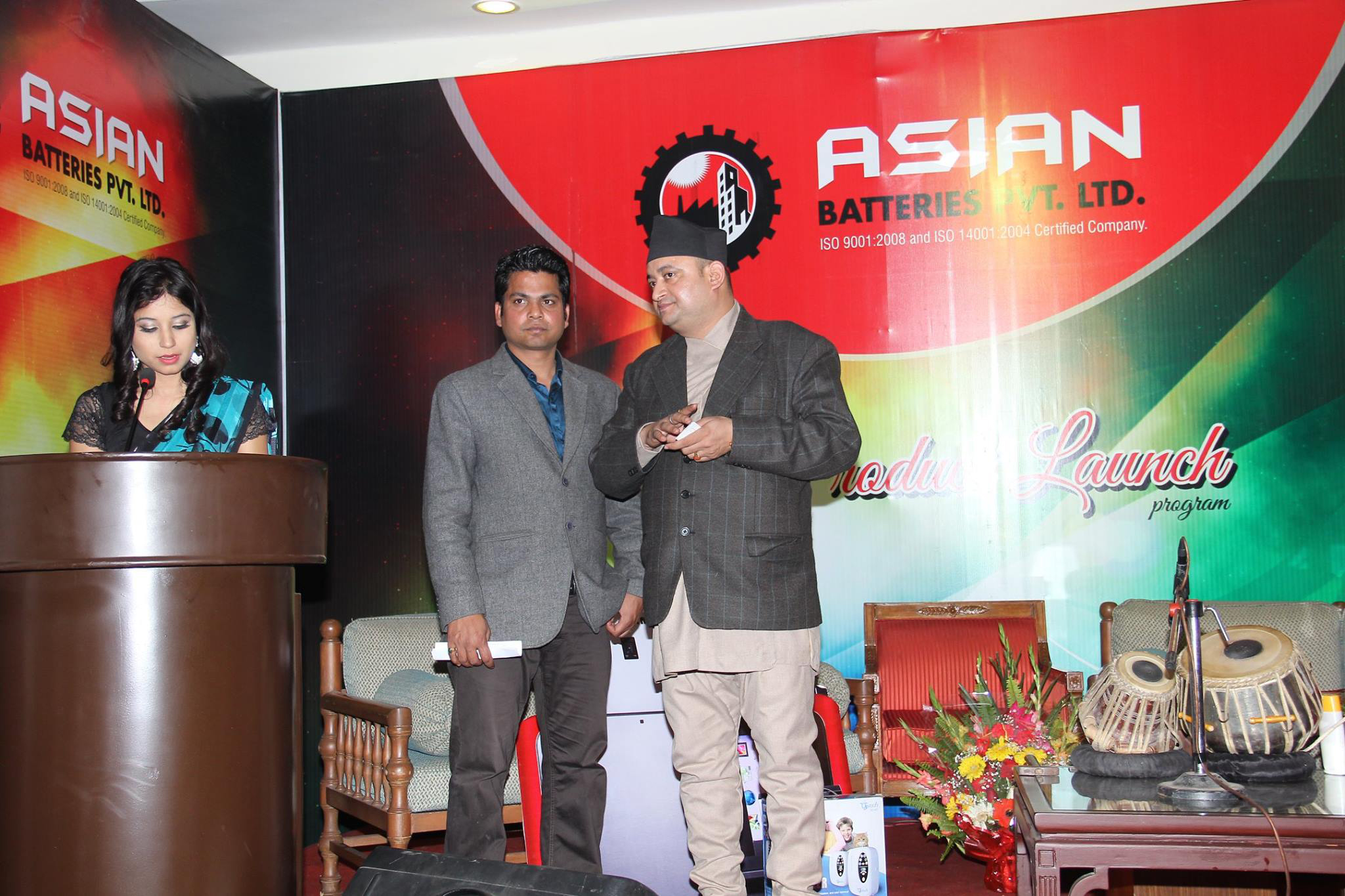 MD of Asian Battery Suresh Lohani, Event Manager Rikesh Karna and MC Priyanka Prasai in stage