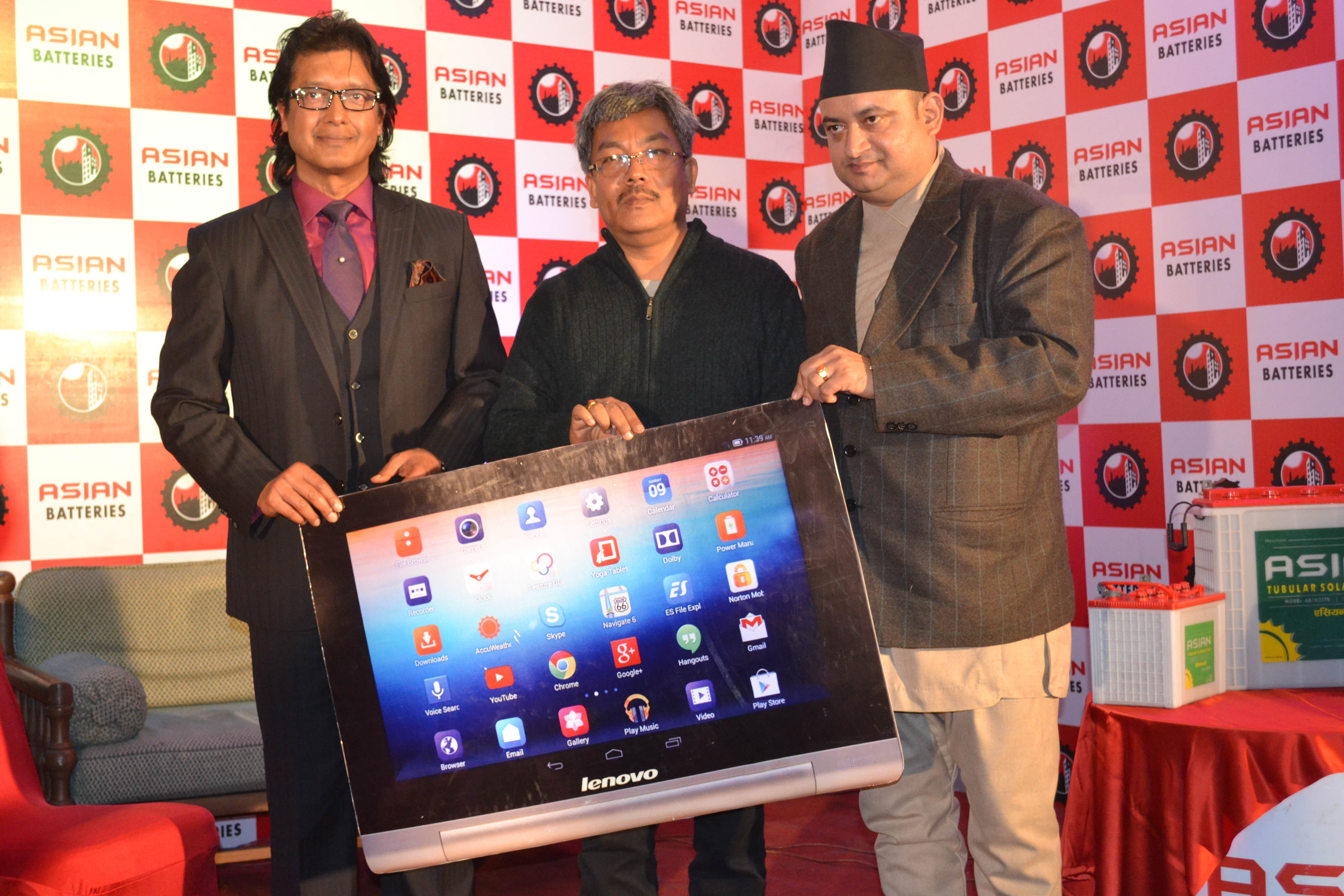 Rajesh Hamal Celebrity guest and MD of Asian Battery Suresh Lohani distributing gift to dealers