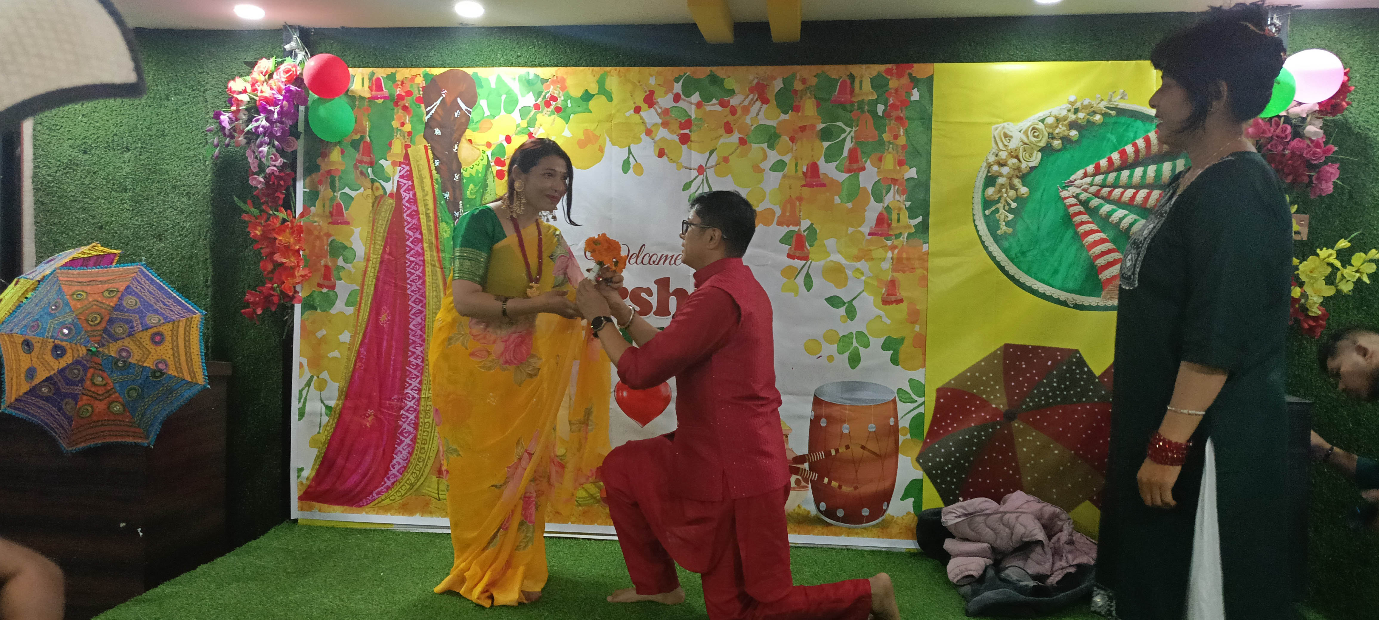 The bride presenting a flower bouquet to the groom.