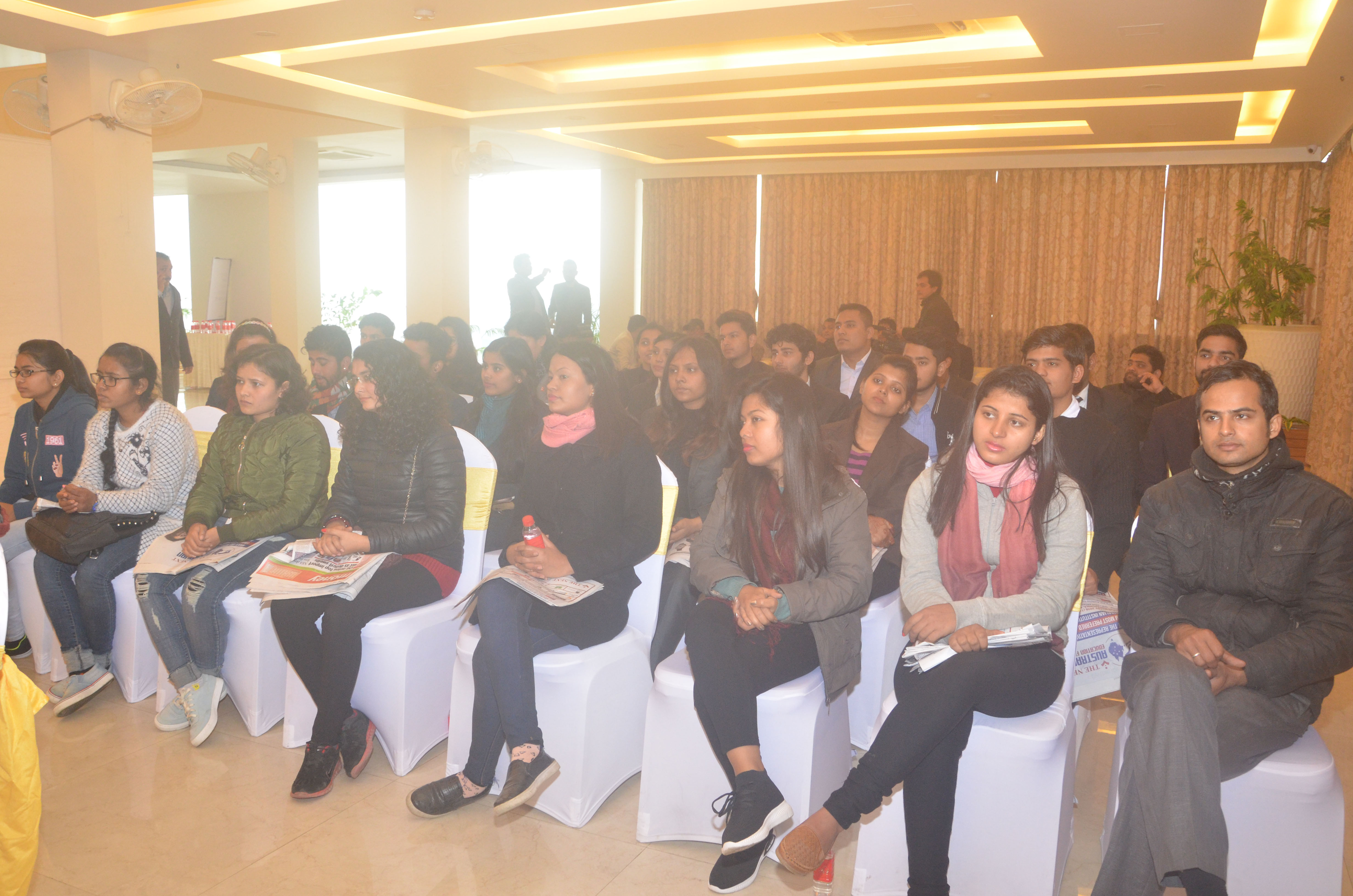Guests seated in the hall during the program.