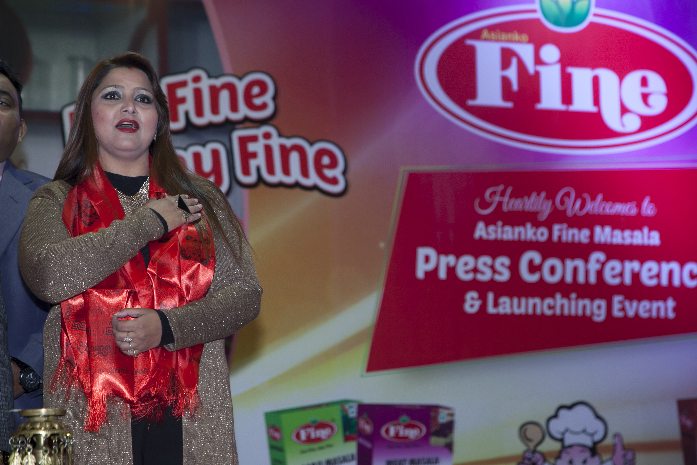 Brand Ambassador of Fine Masala, Deepashri Niraula, singing the National Anthem.