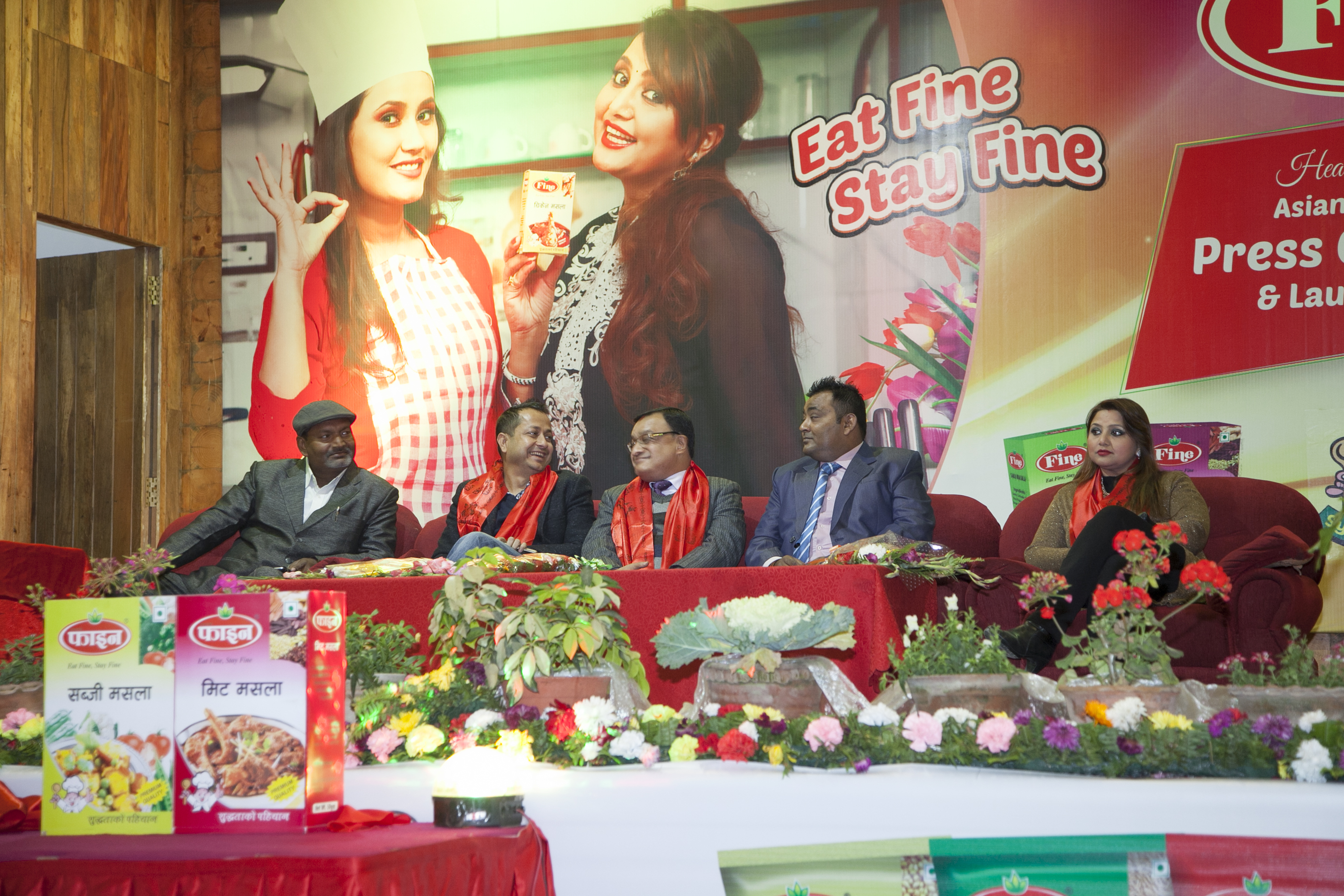 Management team and guests on the dais at the Fine Masala product launch.