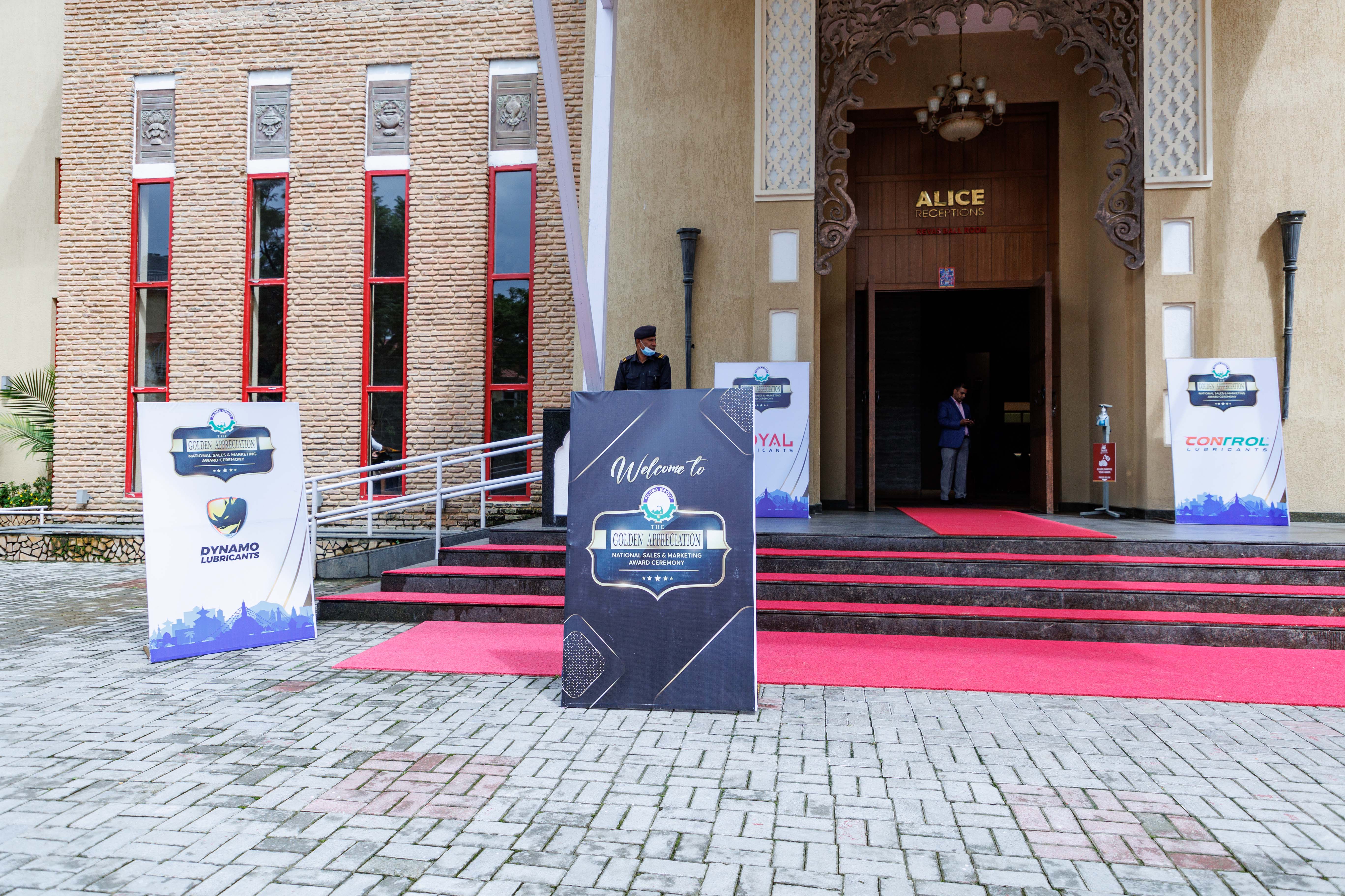 Welcome board for dealers and the company management team, featuring three brands.