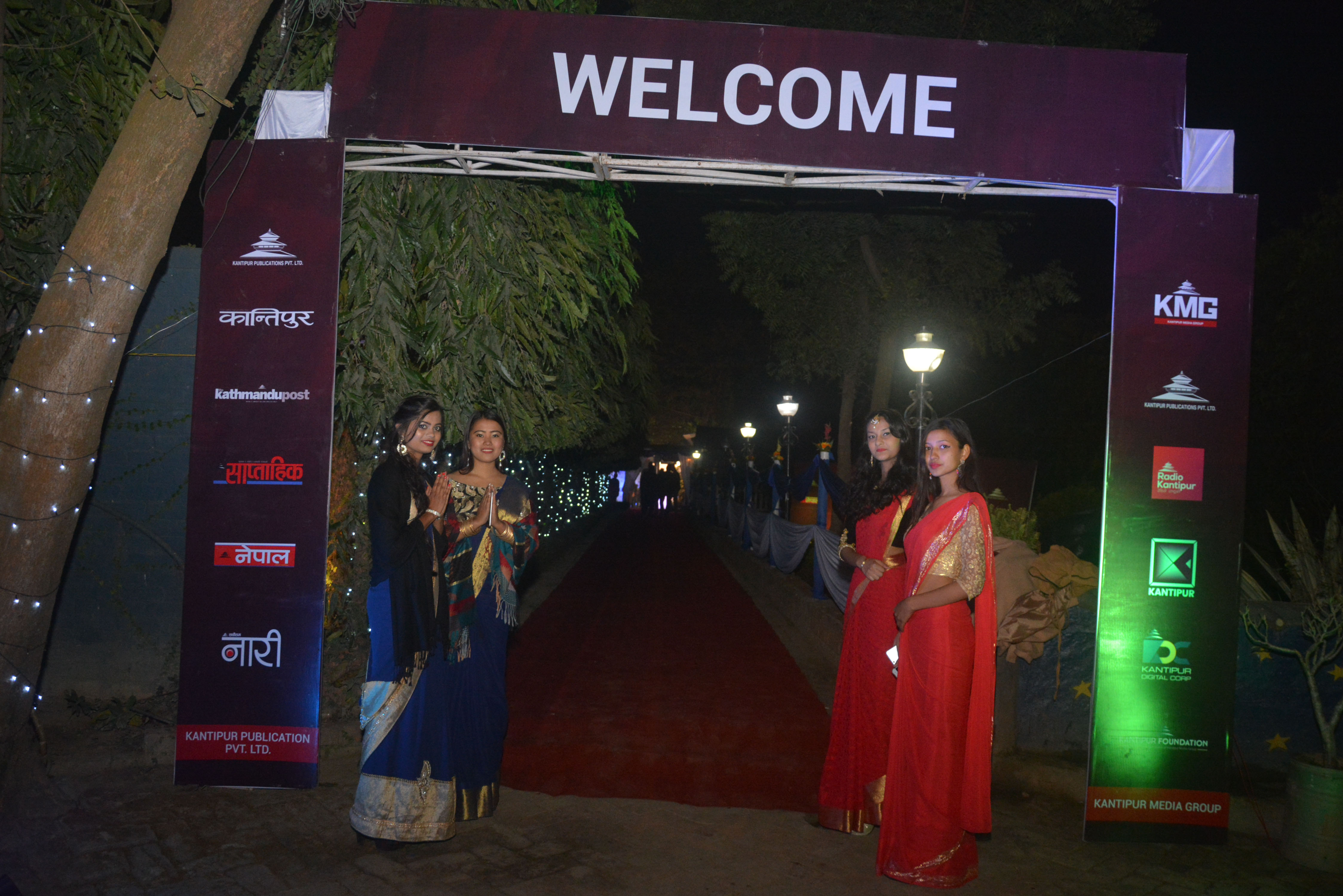 Ushers welcoming guests at the entrance gate.