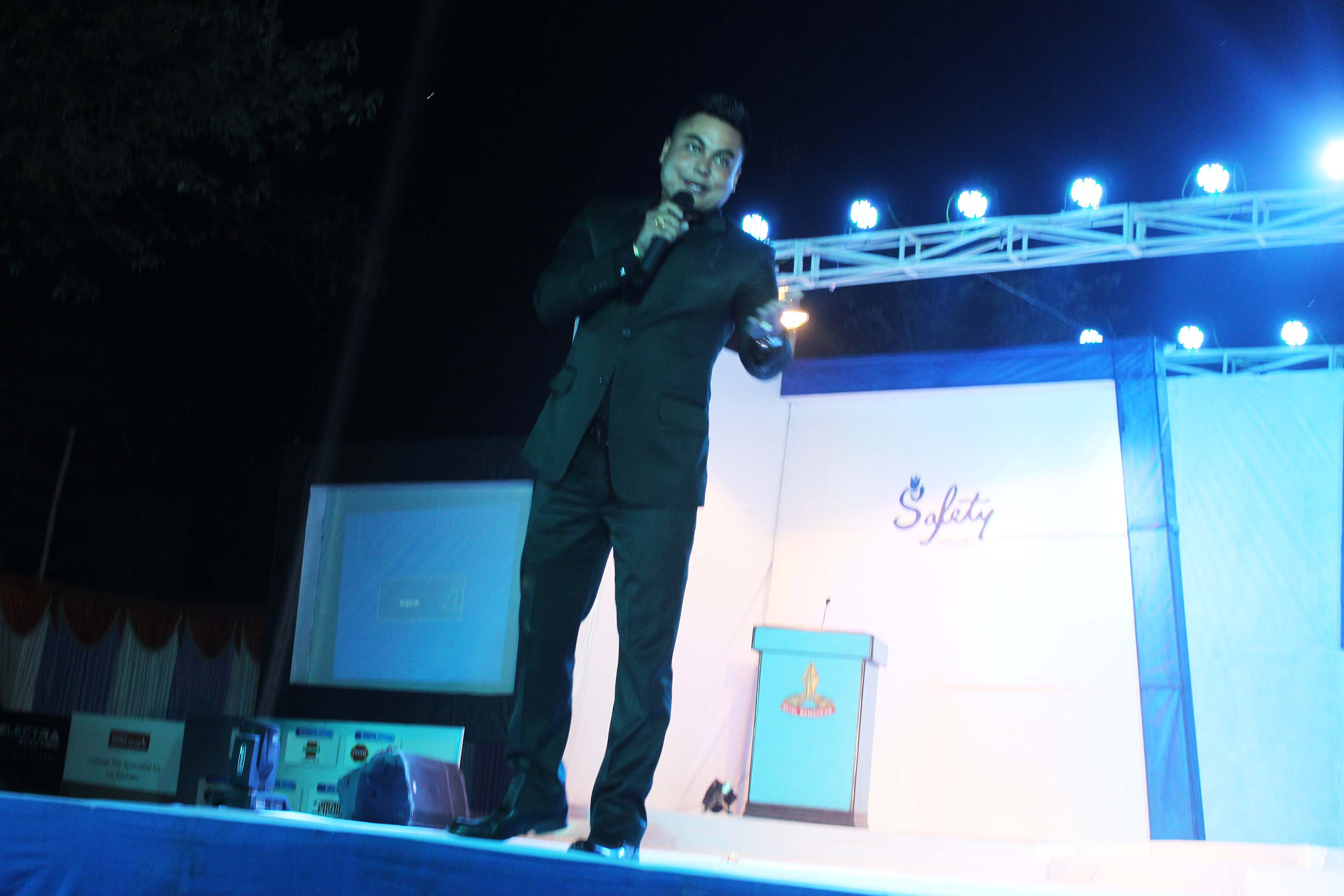 Comedian Sandip Chhetri performing on stage.