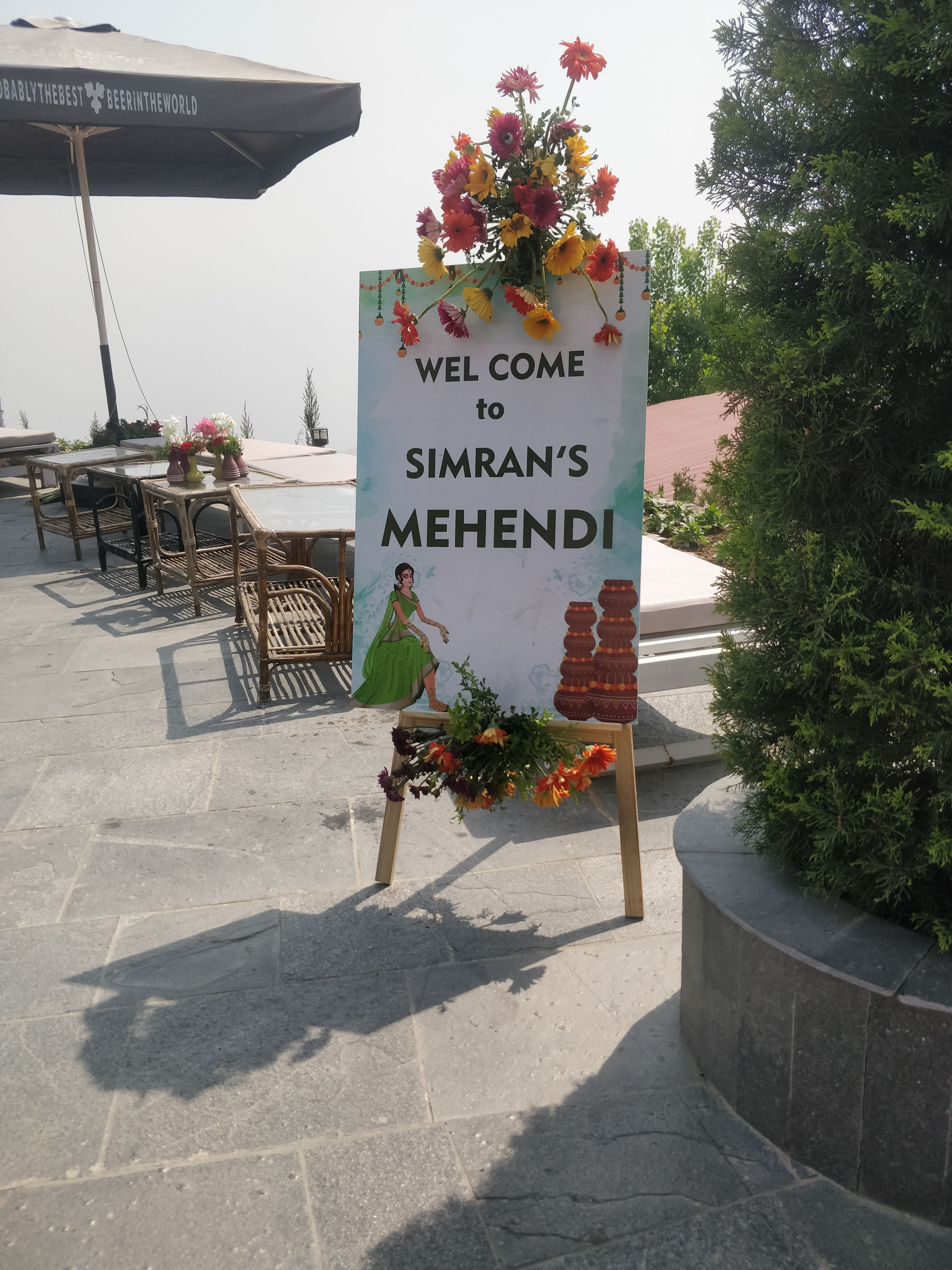 A personalized welcome signage board for the Mehendi ceremony.