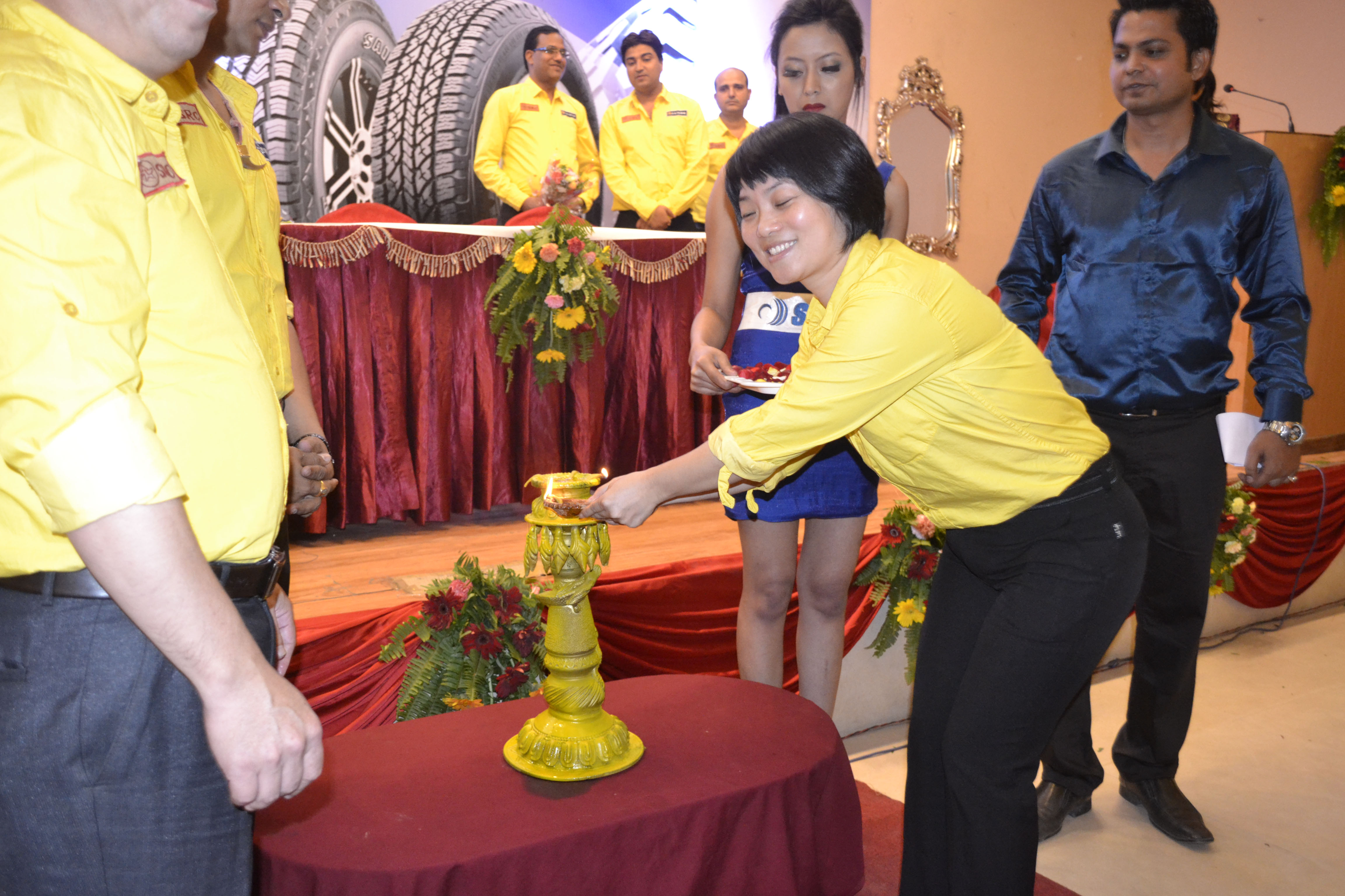 Chief guest lighting the traditional panas lamp.