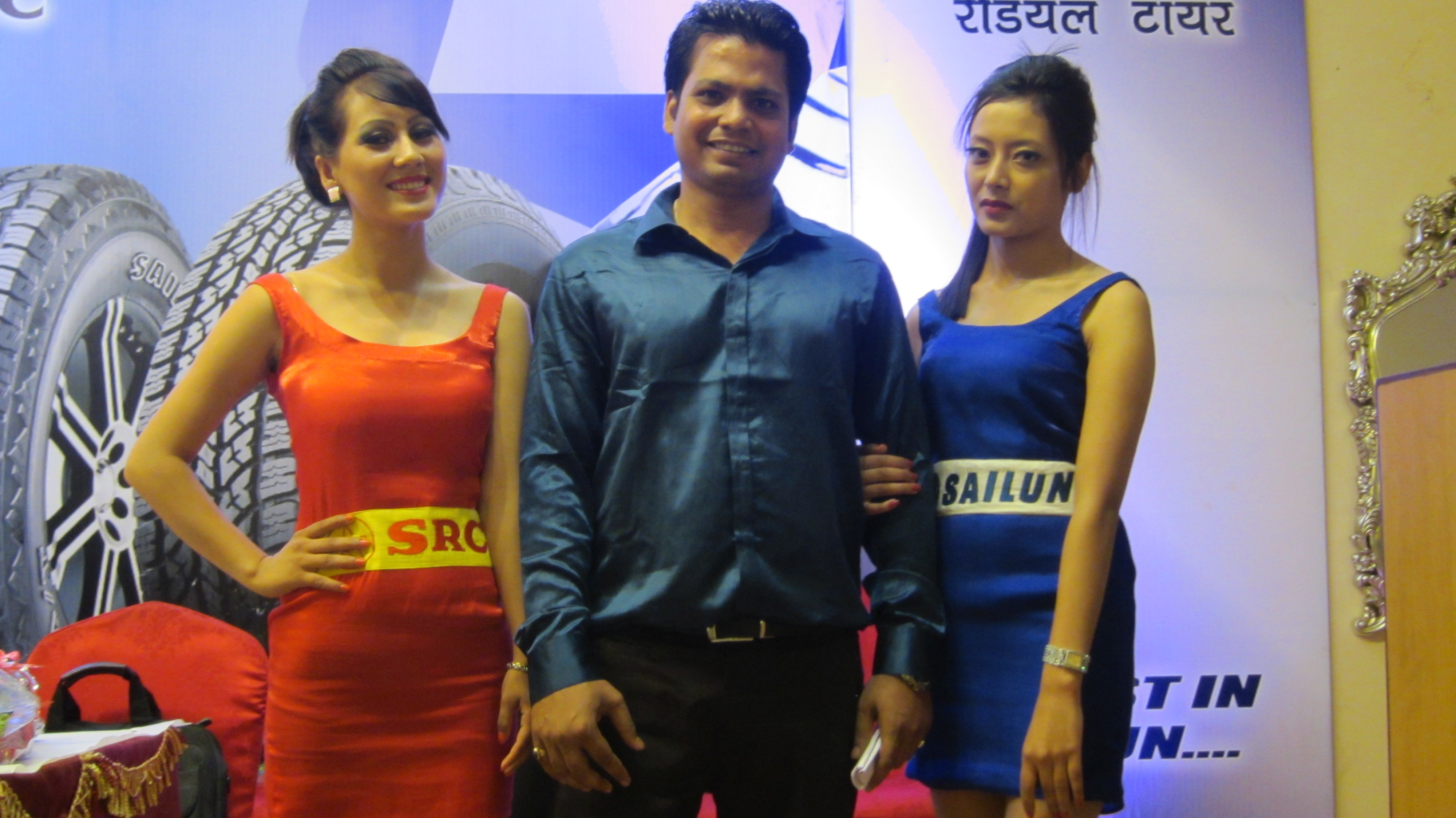 Event Manager Rikesh Karna with the event ushers.