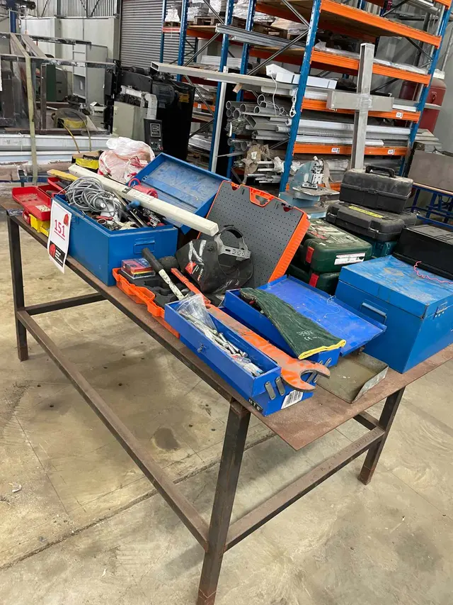 STEEL WORKTABLE WITH VARIOUS TOOLBOXES, DRILL, TOOLS, LEADS, ETC