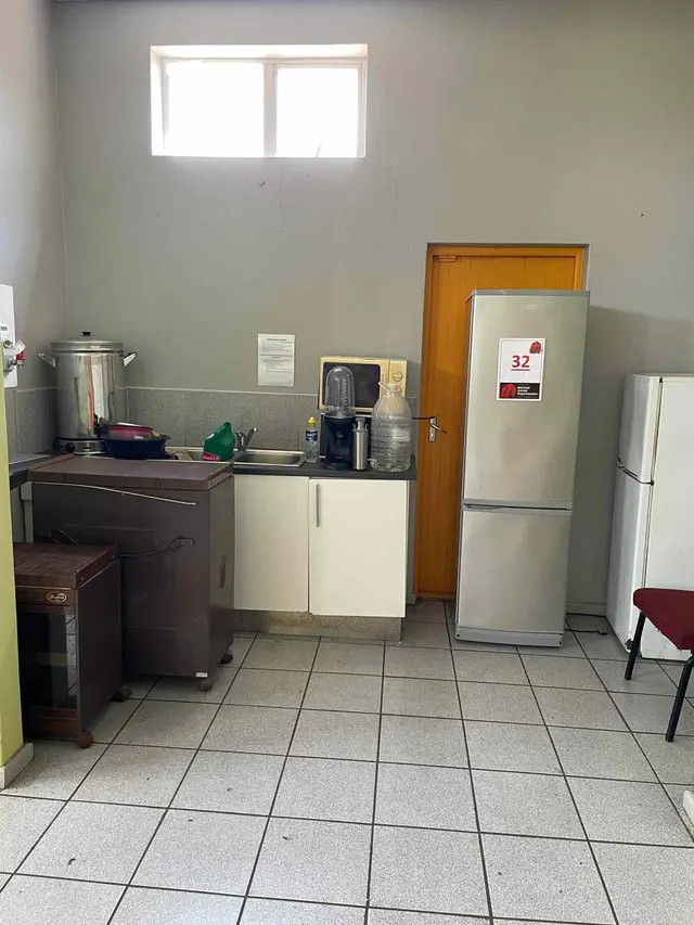DEFY METALLIC FRIDGE, KIC WHITE FRIDGE, 2 X MICROWAVES (DEFY & KELVINATOR), URN, FLASK, CHAIR & COOLERBOX