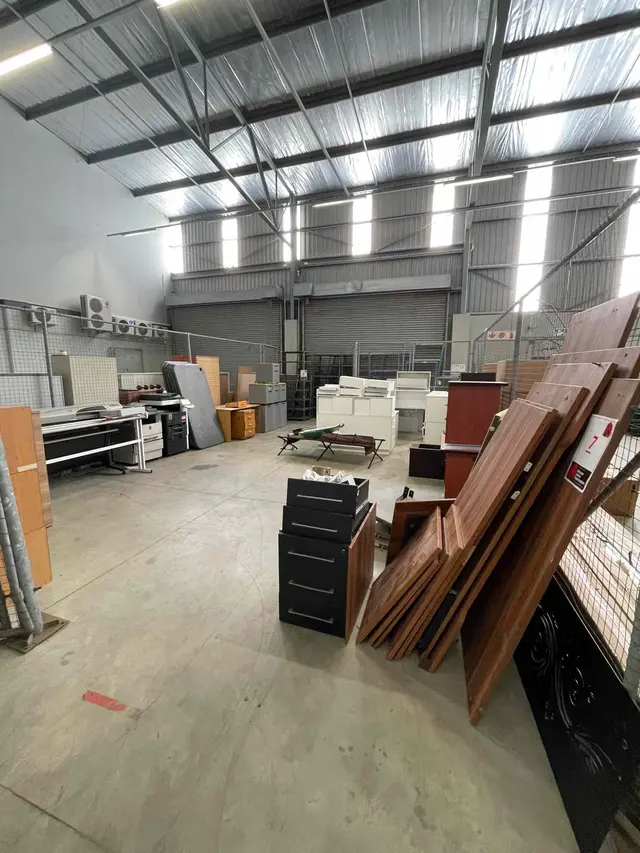 QTY OF CAGE: LARGE QTY WHITE DESKS, CREDENZA'S, PEDESTALS (DISMANTLED , 8 X GREY TABLE TOPS,CAMPING BED, CAMPING CHAIR, FISHING ROD, CHRISTMAS TREE, 2 X GUEST CHAIRS, OAK DESK, OAK PEDESTAL, 4 X PADDED TOP WHEELY PEDESTALS, 2 X ITEX B283 & B211 COPIERS, HP PRINTER, IDEAL STAND, 2 X STEEL TABLES, QTY SIDE DEVIDER PANELS, DUSTBINS, QTY X DARK WOOD PEDESTALS, CHERRY WOOD PEDESTAL  & CREDENZA, WOODEN DESK & PEDESTAL (DISMANTLED)