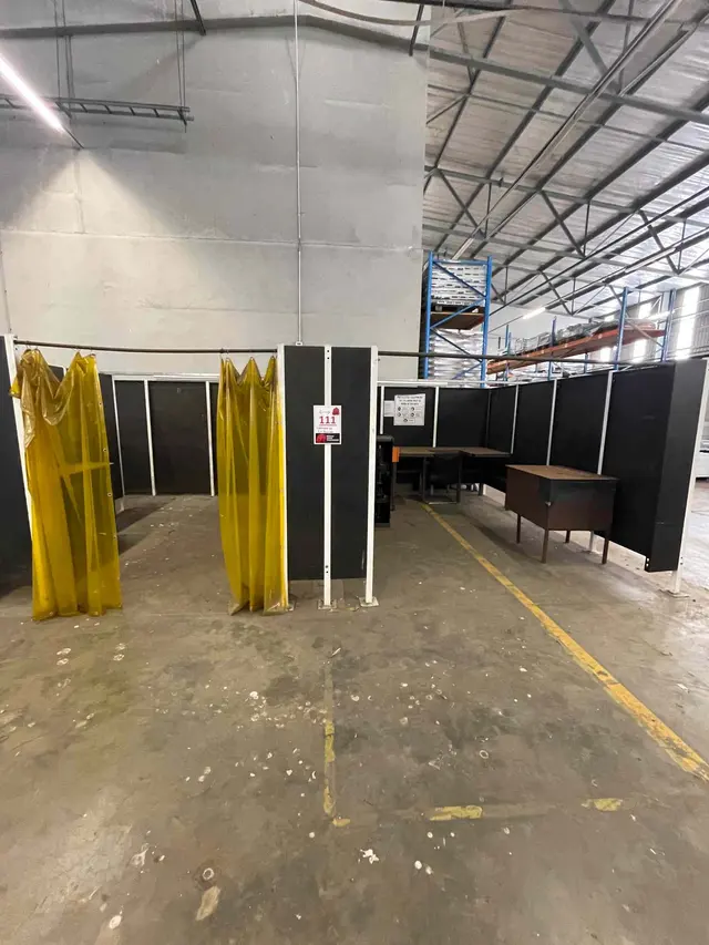 CONTENTS OF 2 WELDING BOOTHS: 3 X STEEL WORKTABLES, 2 X STEEL TOOLCUPBOARDS, REEF - LEX MACHINE & CHAIR