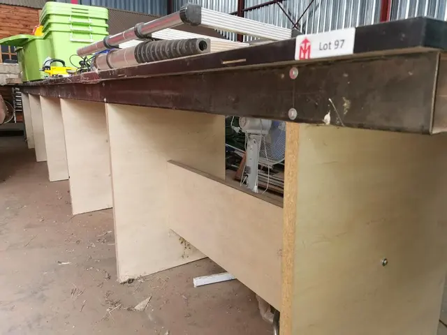 Lot 97 - Long wooden workbench