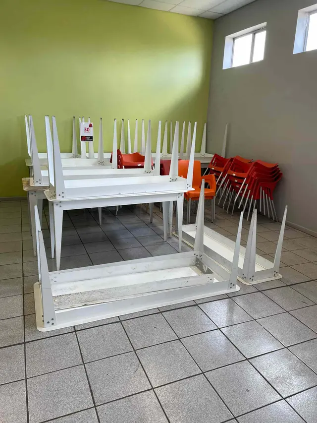 10 X SQUARE WHITE STEEL TABLES & 21 X ORANGE PLASTIC CHAIRS