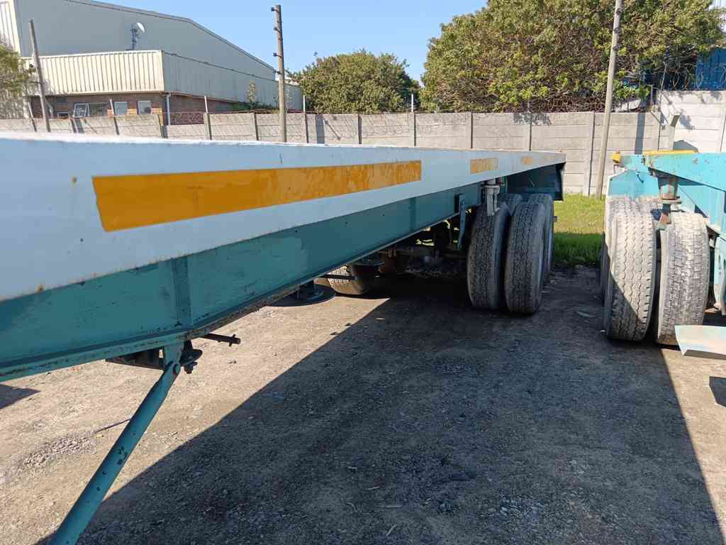 1976 HENRED FRUEHAUF FLAT DECK DOUBLE AXLE 12M