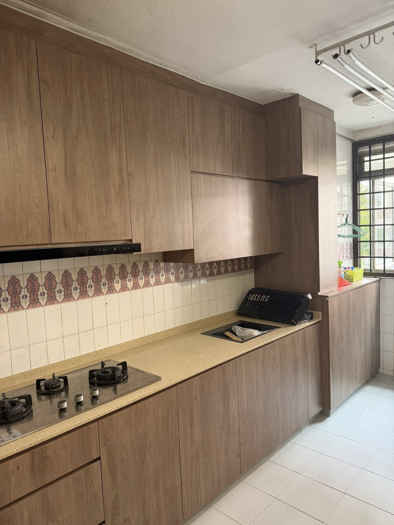 Modern Wood-Grain Galley Kitchen
