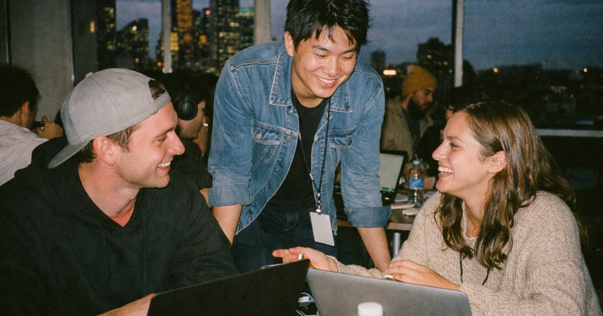 Participants collaborating at an AI hackathon in Melbourne