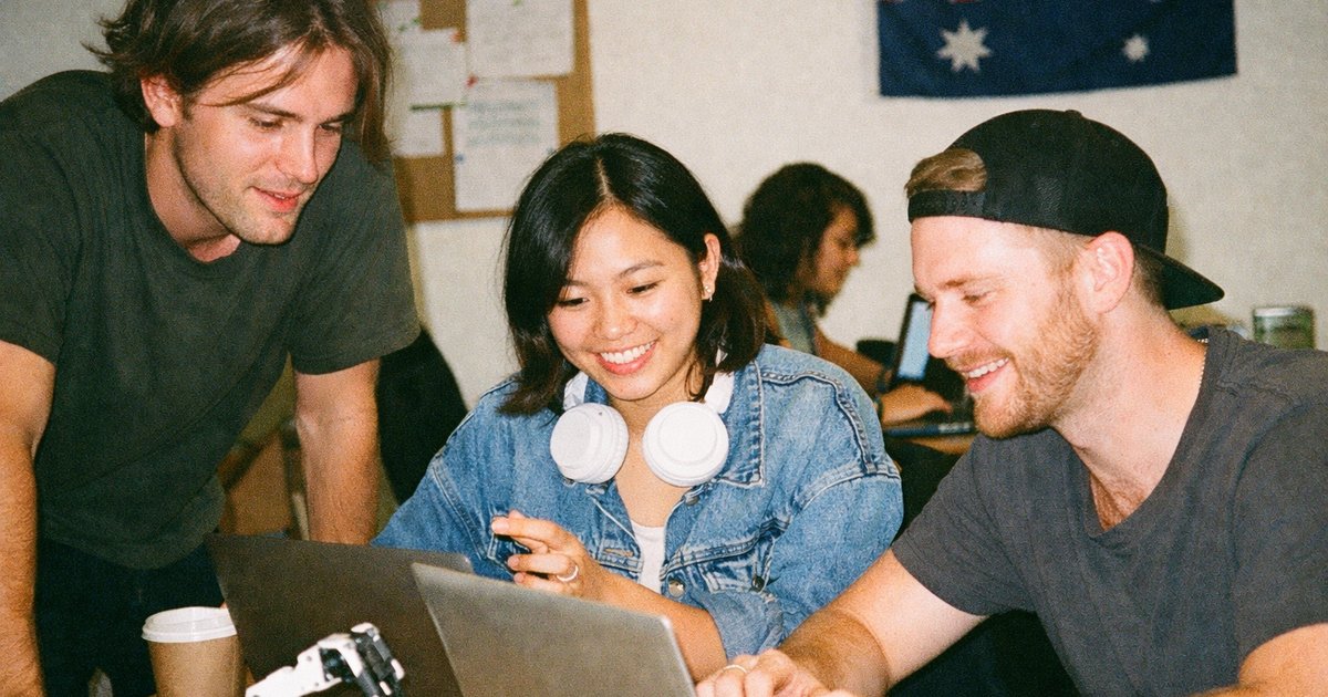 Person studying AI concepts on a laptop with diagrams on screen