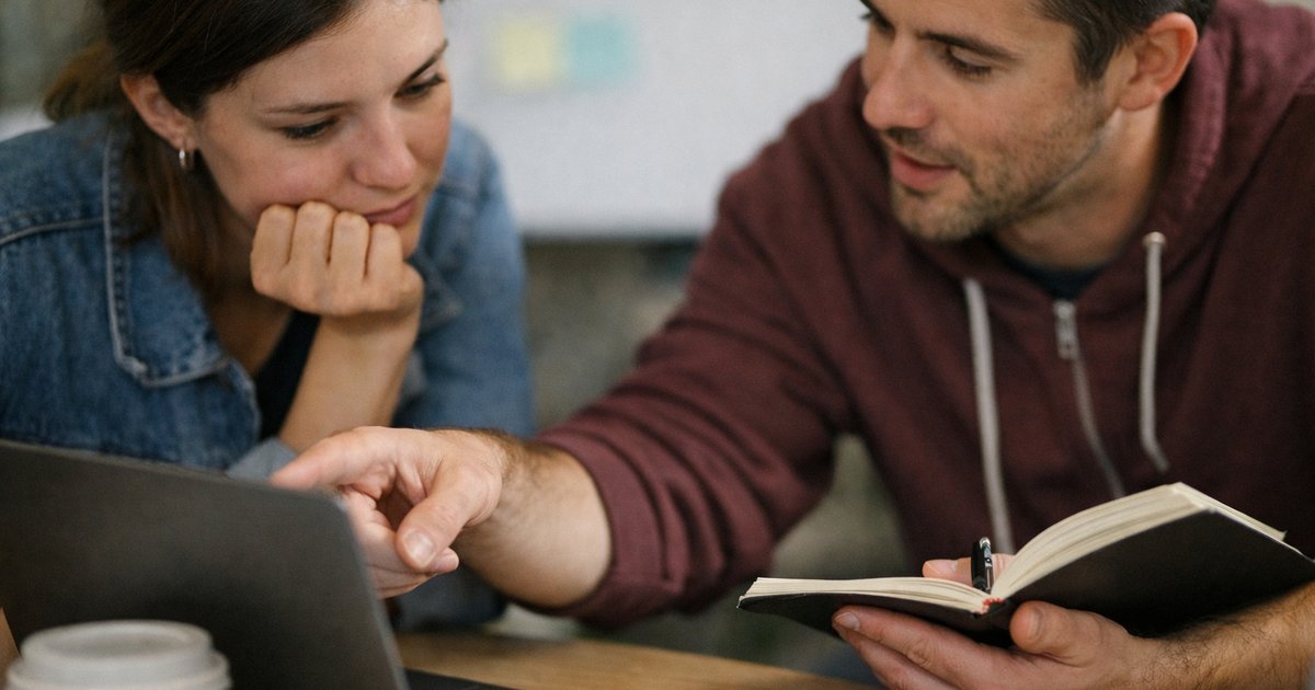 Startup founders discussing whether a new venture is built for scalable growth or steady small-business income