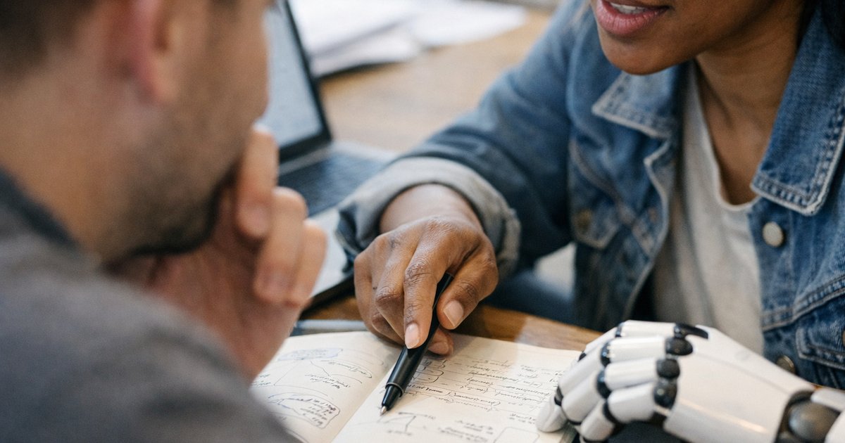 Ultra-close candid of a worker\u2019s hands switching between sketches, code, and chat on