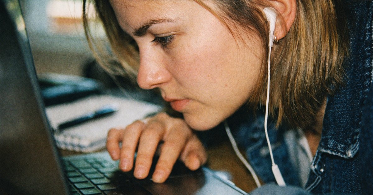 People collaborate in a tech startup setting, showcasing access and flexibility in online learning environments.