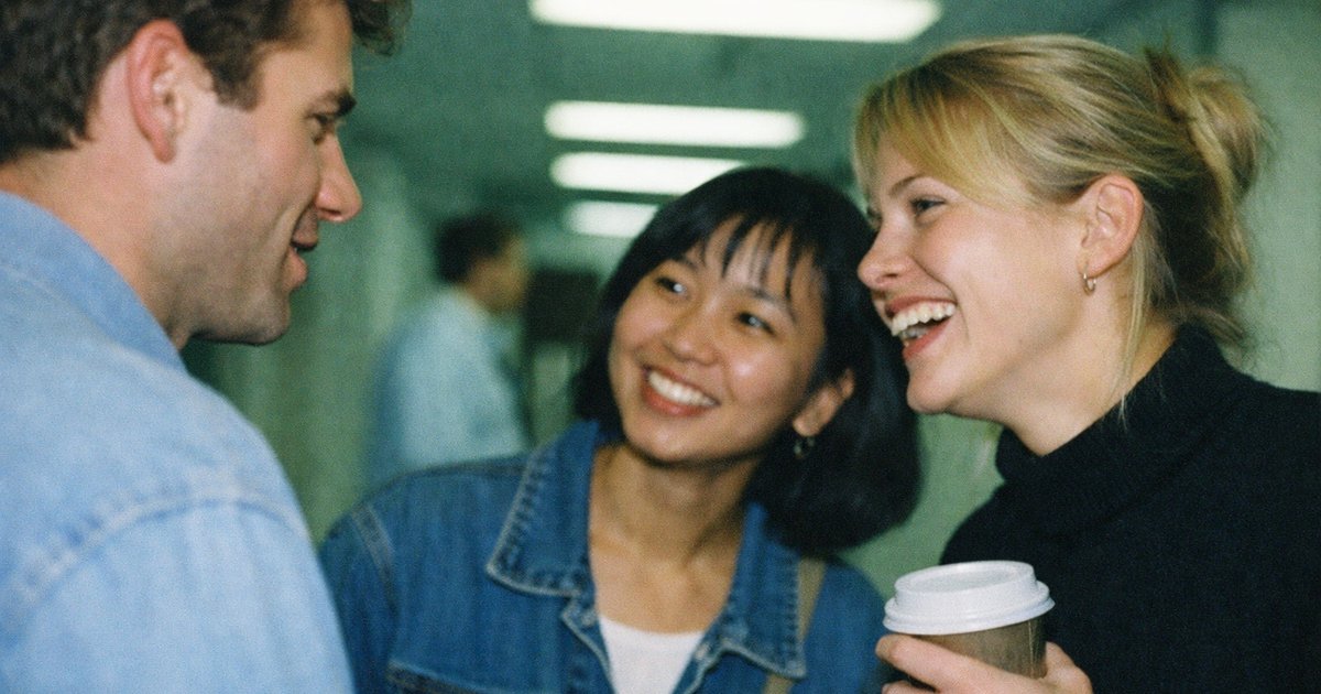 Tech team brainstorming in a 90s film aesthetic during a focused pilot project session.