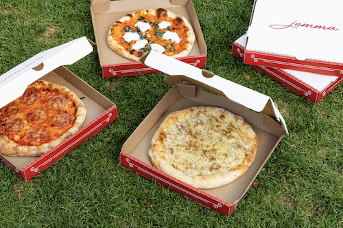 Five boxes of different pizzas available for take-out at Jemma Hollywood.