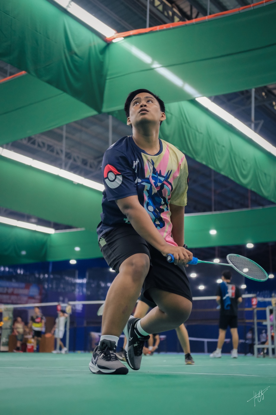 Enri Gil Songco, badminton player