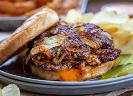 Juicy fried onion burger, a hidden Oklahoma City culinary gem, evoking local pride and mouthwatering flavor.
