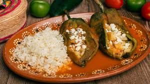 Golden chiles rellenos, El Paso's secret, steaming with vibrant Tex-Mex spirit.