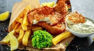 Golden fish & chips on a Brighton pier, vibrant seaside mood