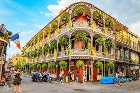 Vibrant French Quarter street scene, New Orleans, with lively jazz music vibe and inviting atmosphere.