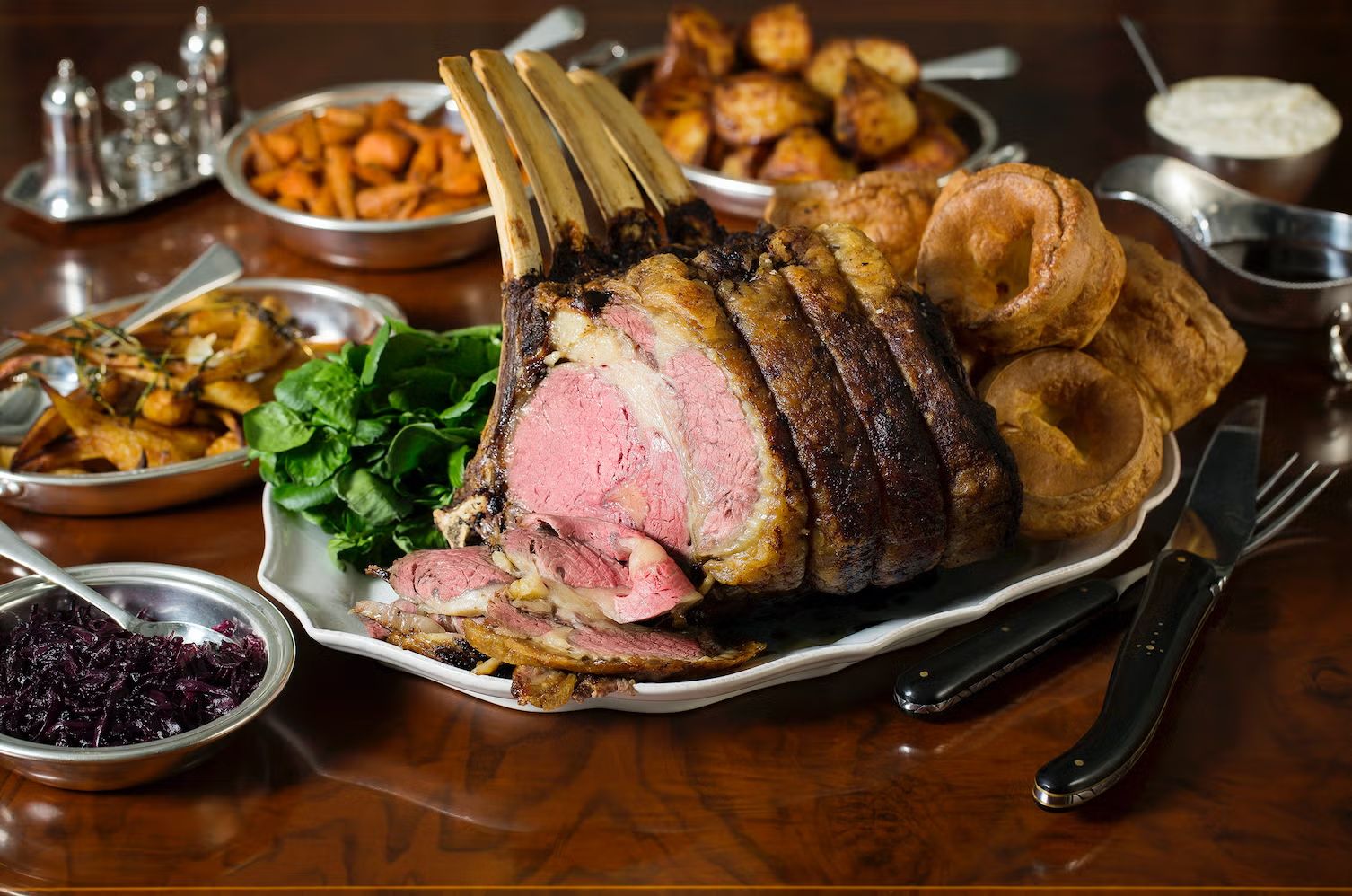 Plated Sunday roast, cozy pub ambience, London's affordable culinary heart revealed.