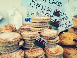 Cozy Cardiff kitchen, golden glow, laverbread & Welsh cakes, embracing delicious local traditions.